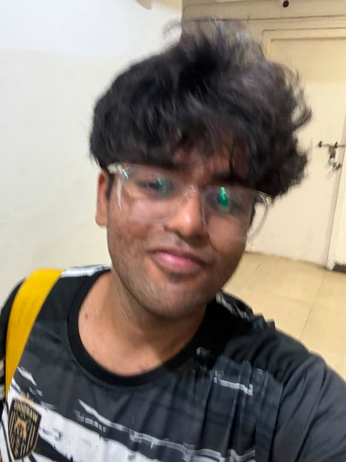 A smiling portrait with glasses